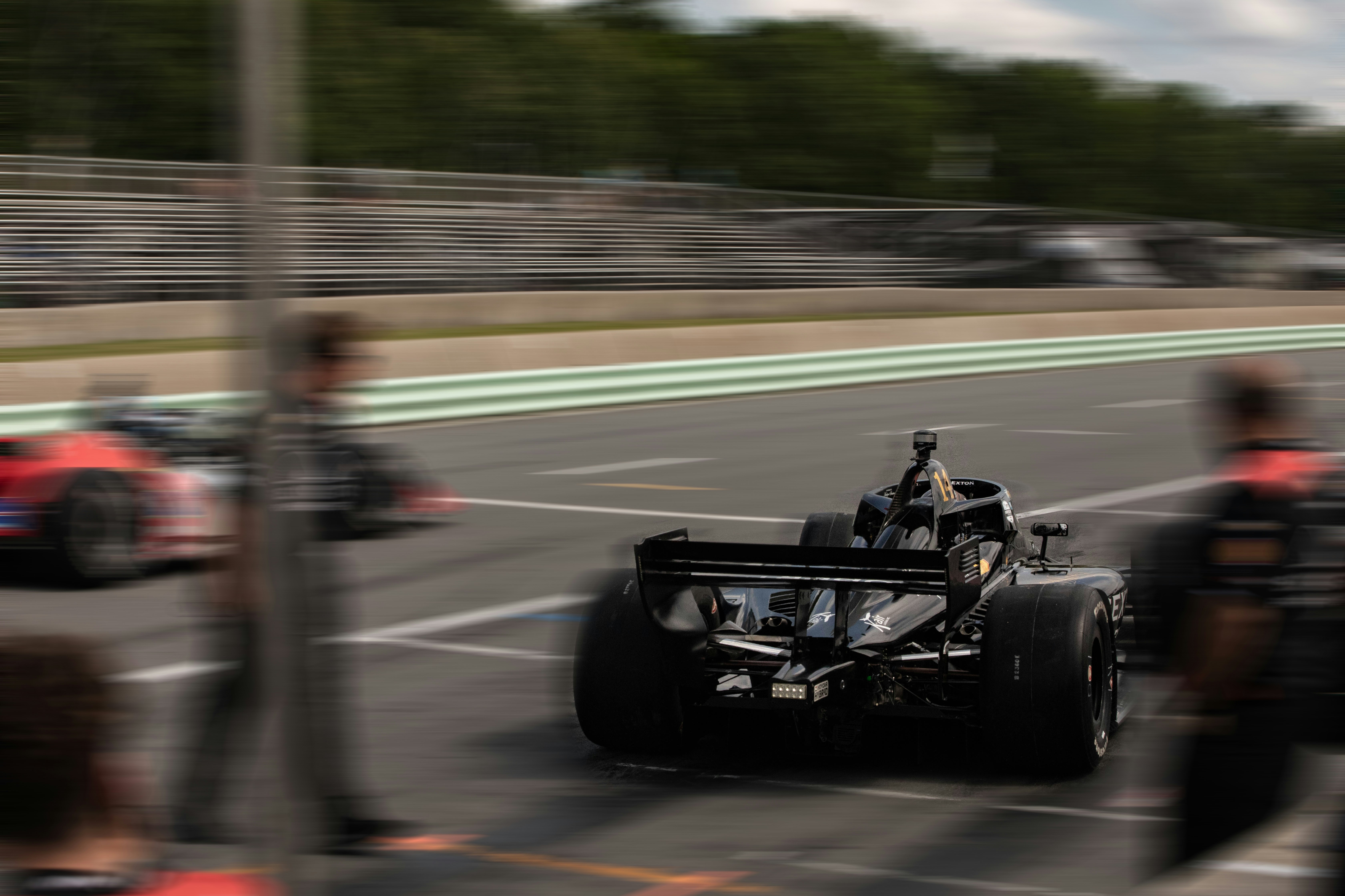 A formula 1 car speeds down the track.