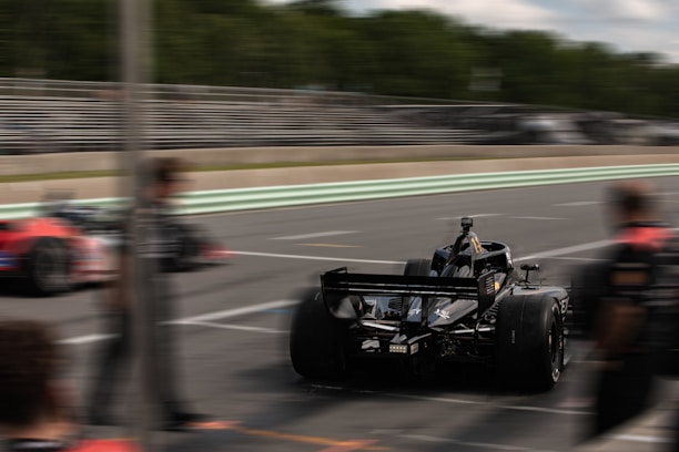 A formula 1 car speeds down the track.