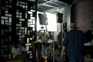 A film crew prepares for a shoot on set