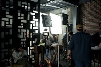 A film crew prepares for a shoot on set.