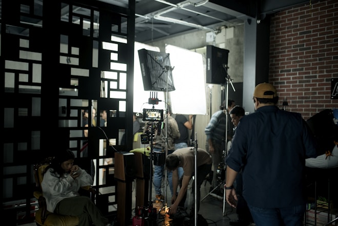 A film crew prepares for a shoot on set.