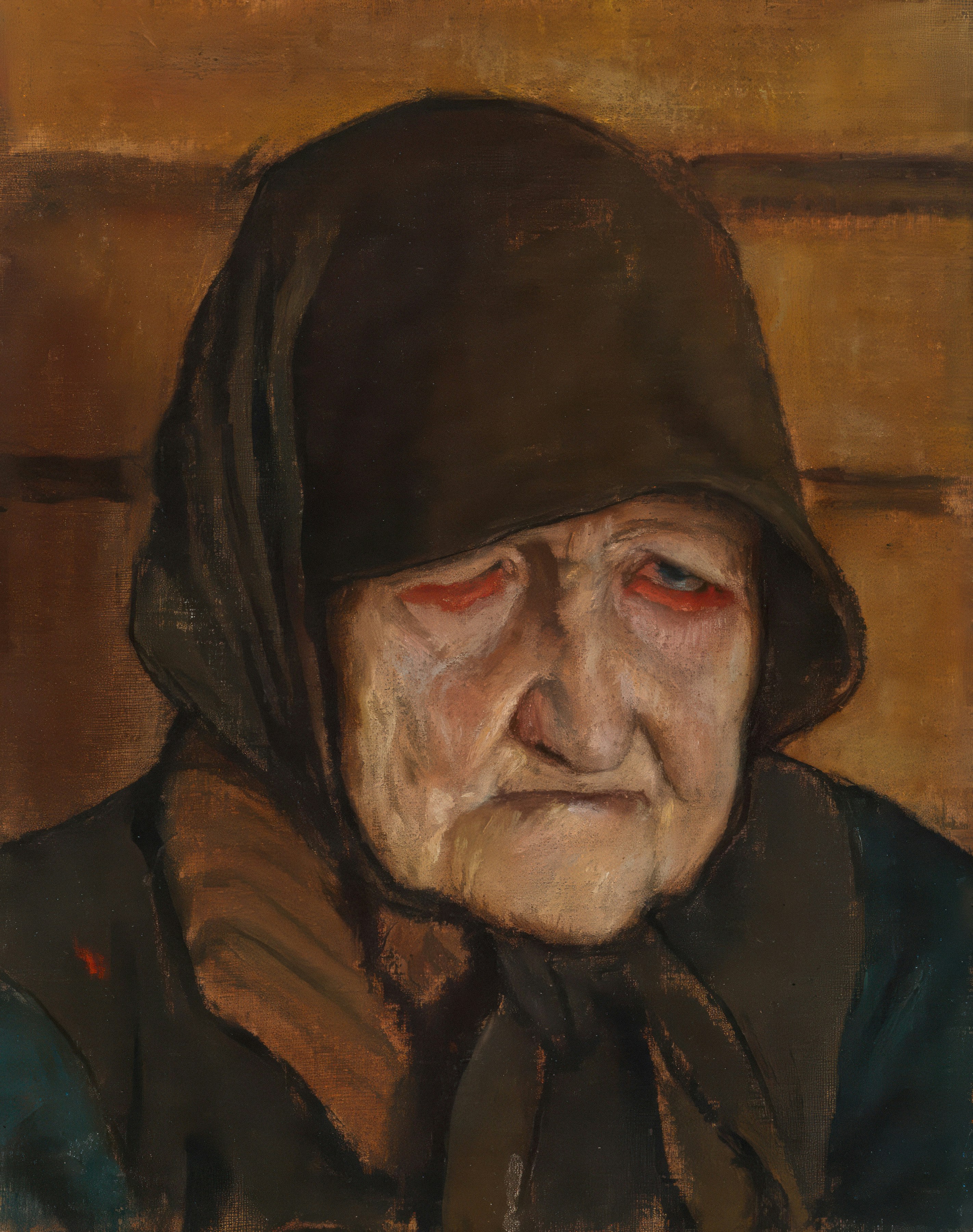 An elderly woman with a headscarf and tired eyes.