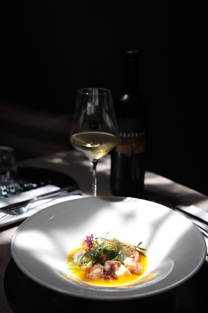 Plated nordic dish in low light — Tommaso Ubezio on Unsplash