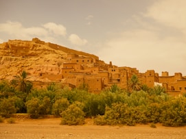 Ancient village built into a desert hillside.