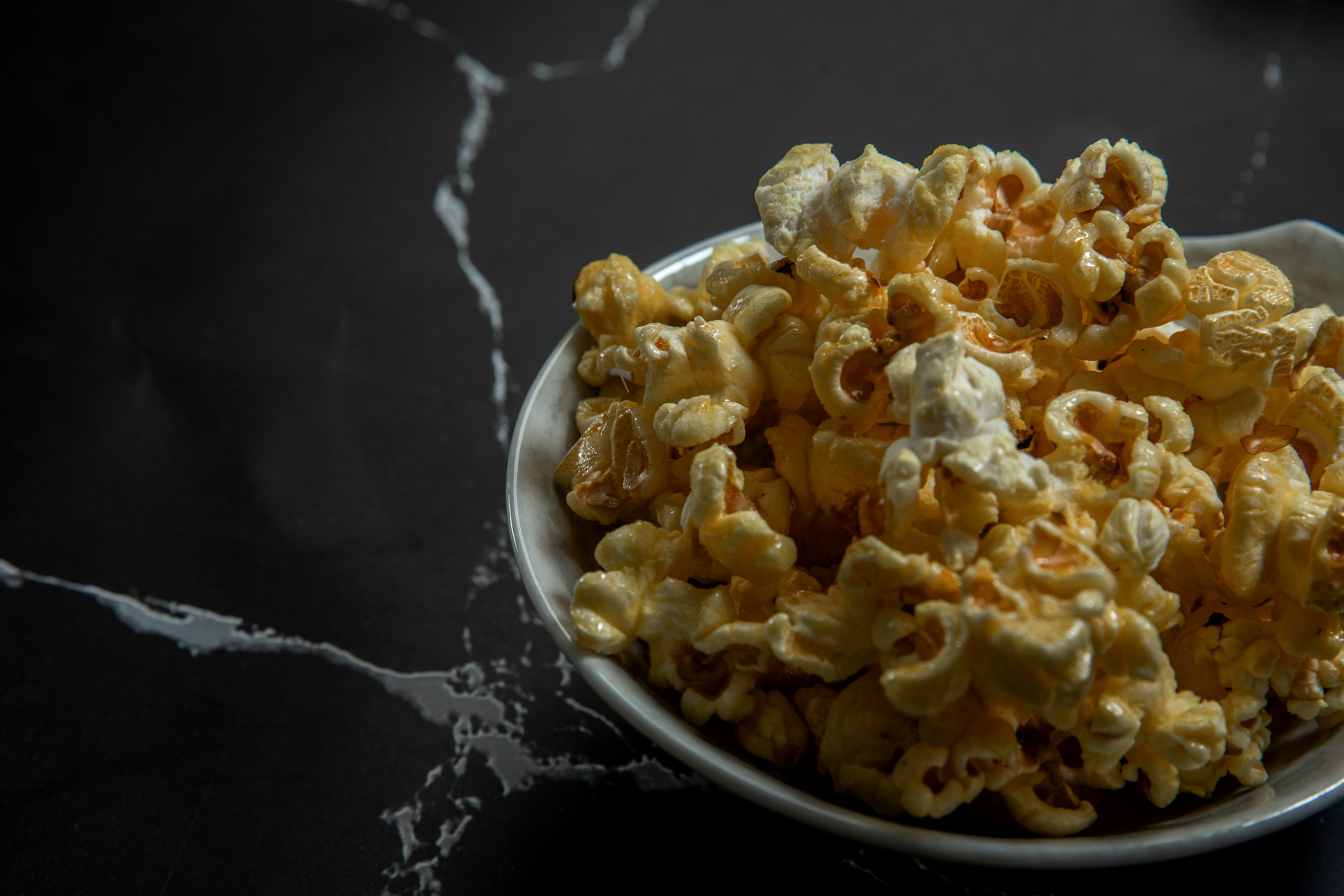 Popcorn in a bowl, ready to be enjoyed.