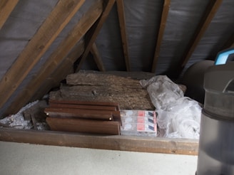 An attic filled with various stored items.