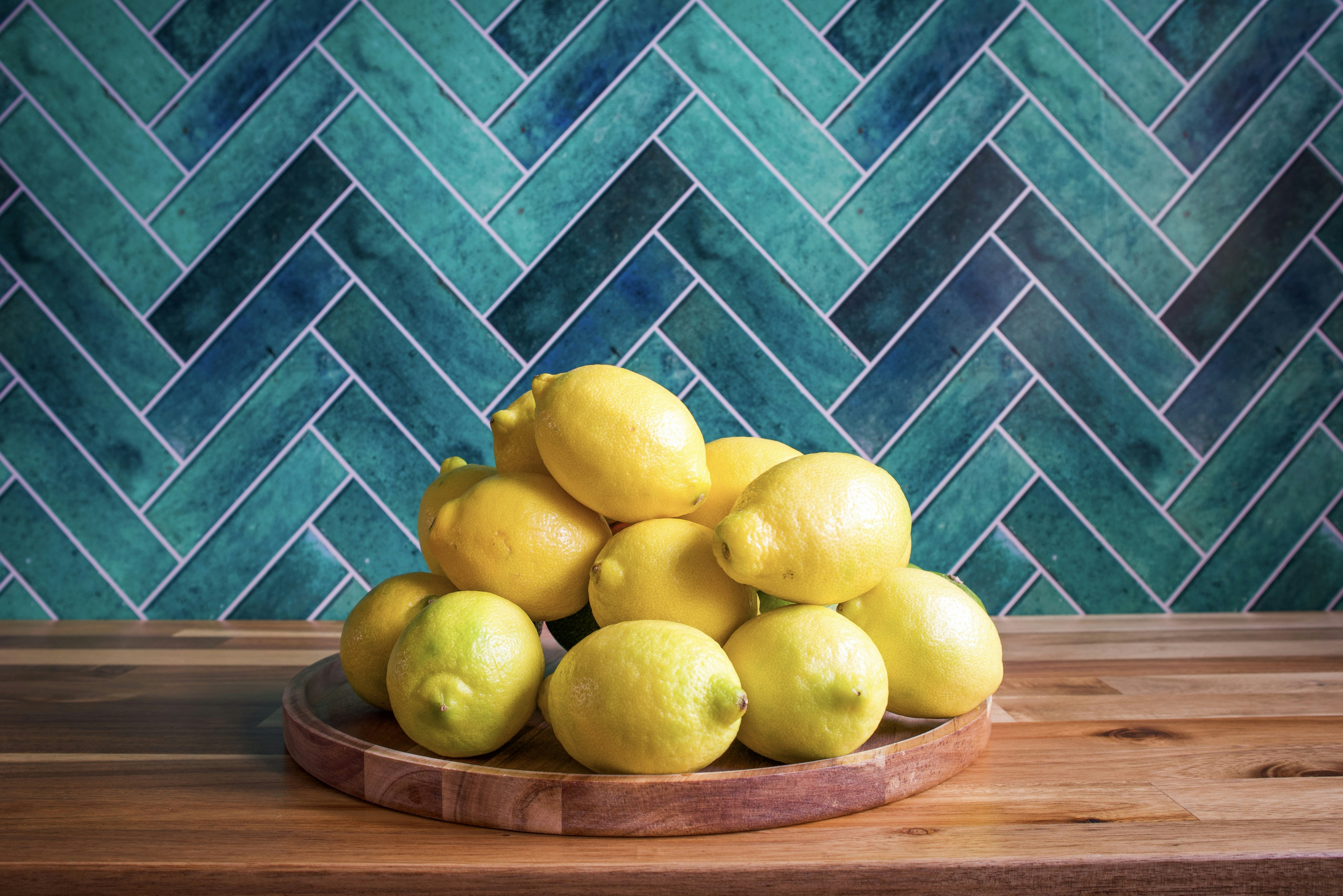 Lemons on wooden tray