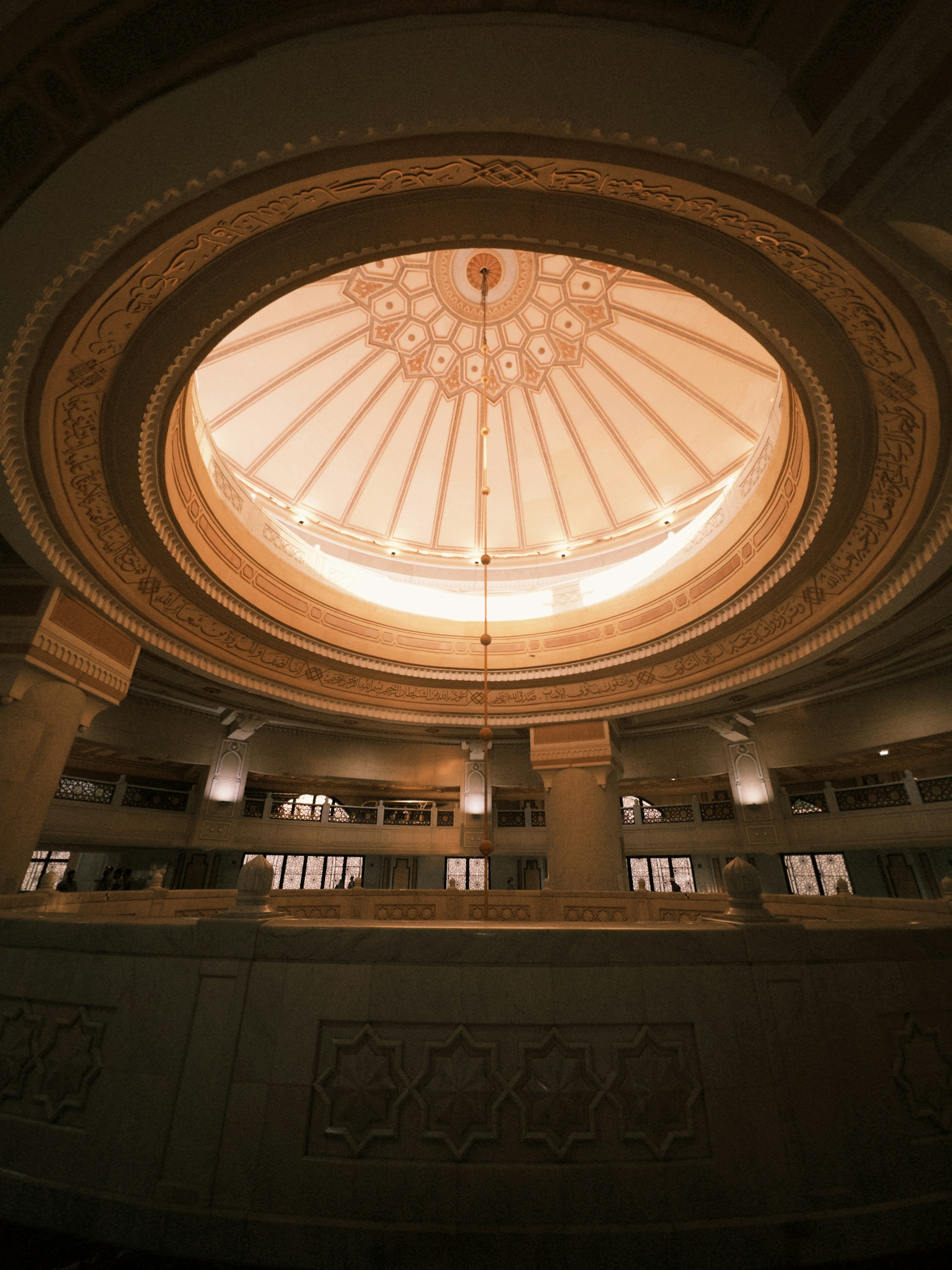 A dome-shaped ceiling with beautiful architecture is shown.