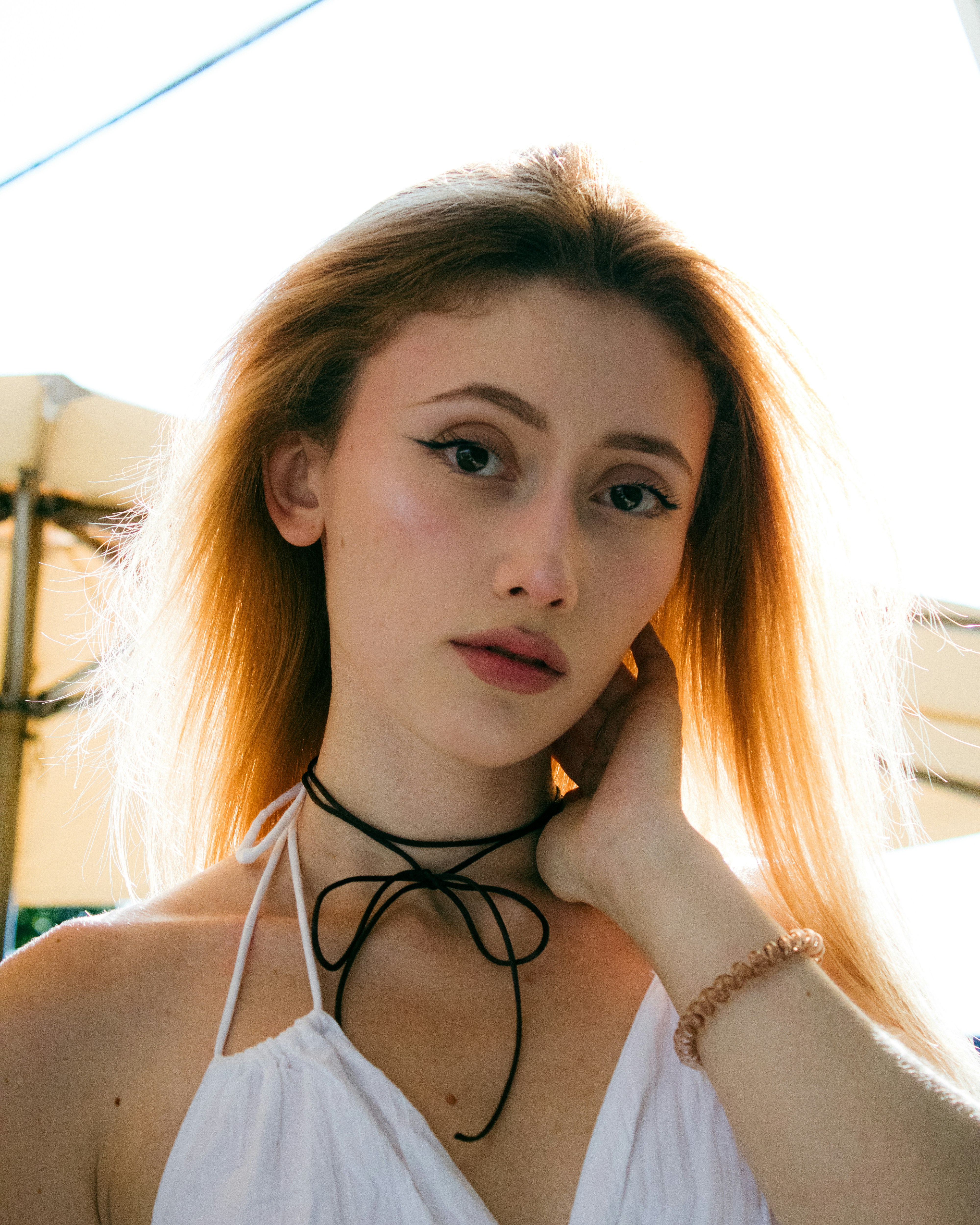 Nia helping villagers carry water