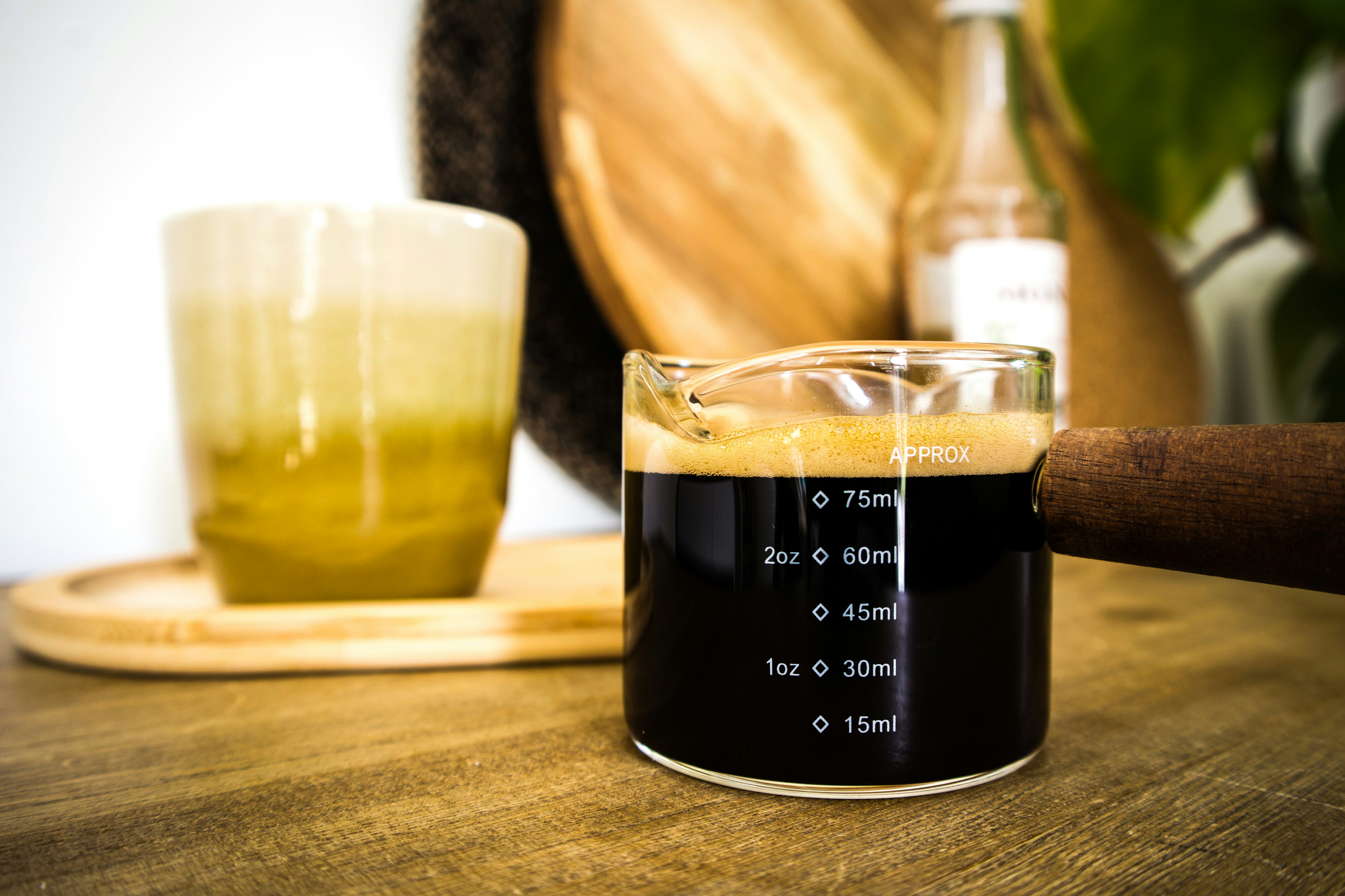 Espresso in glass measuring cup