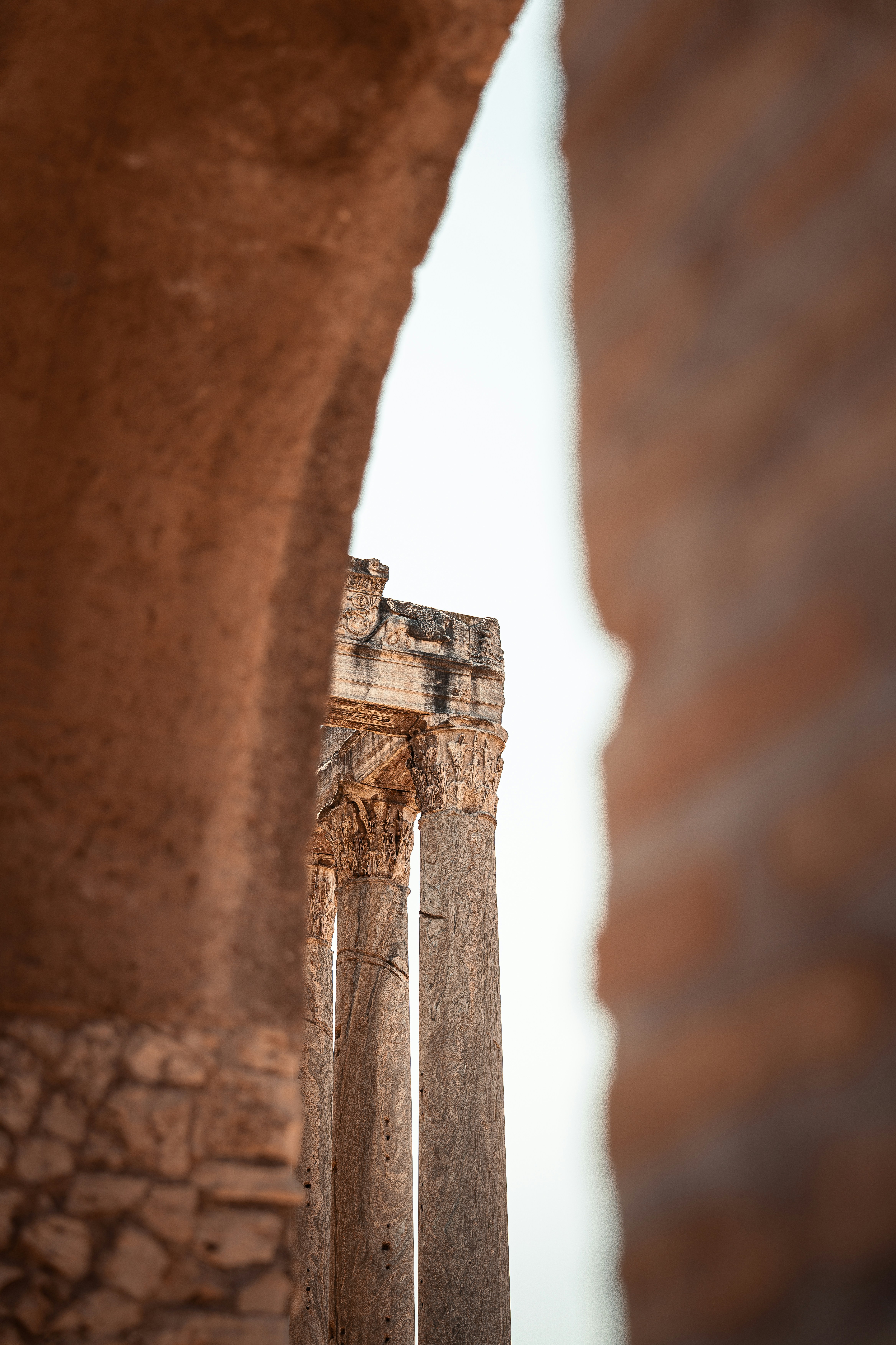 Columns are framed by an archway.