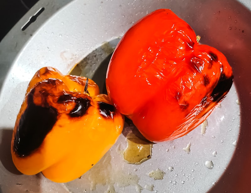 Roasted red bell peppers in a pan