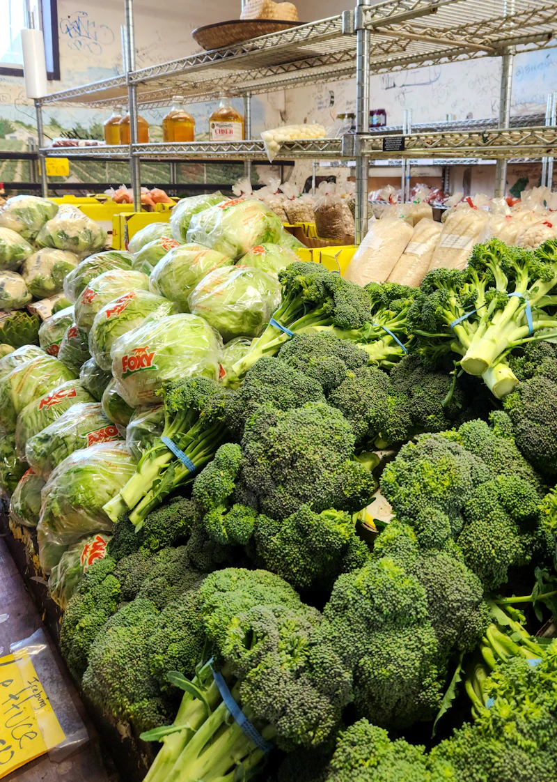 Fresh leafy greens and broccoli at the market