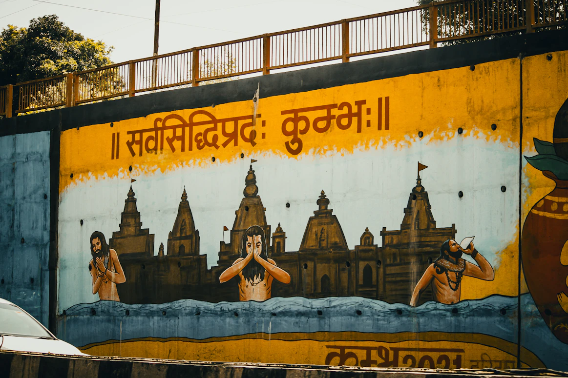 A mural depicts people and temples in the water.