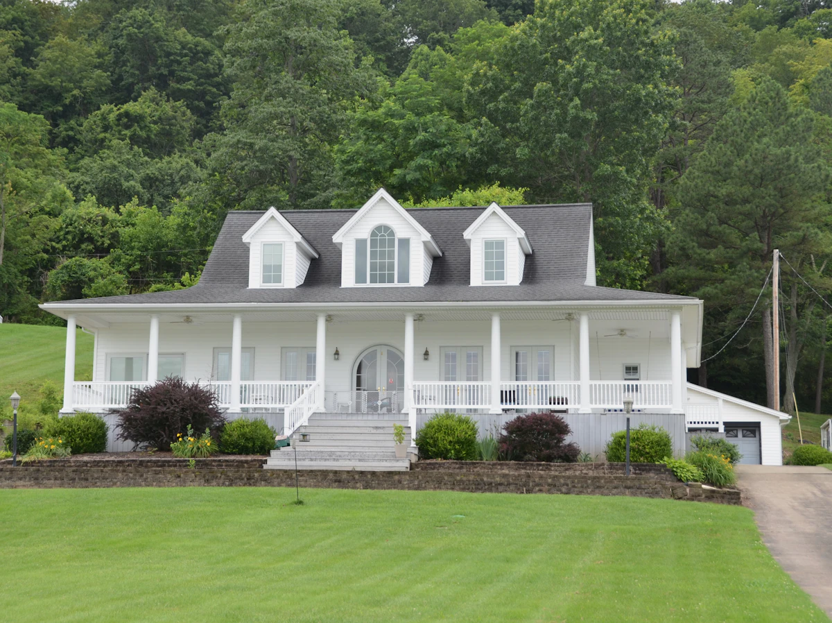 White home with manicured lawn