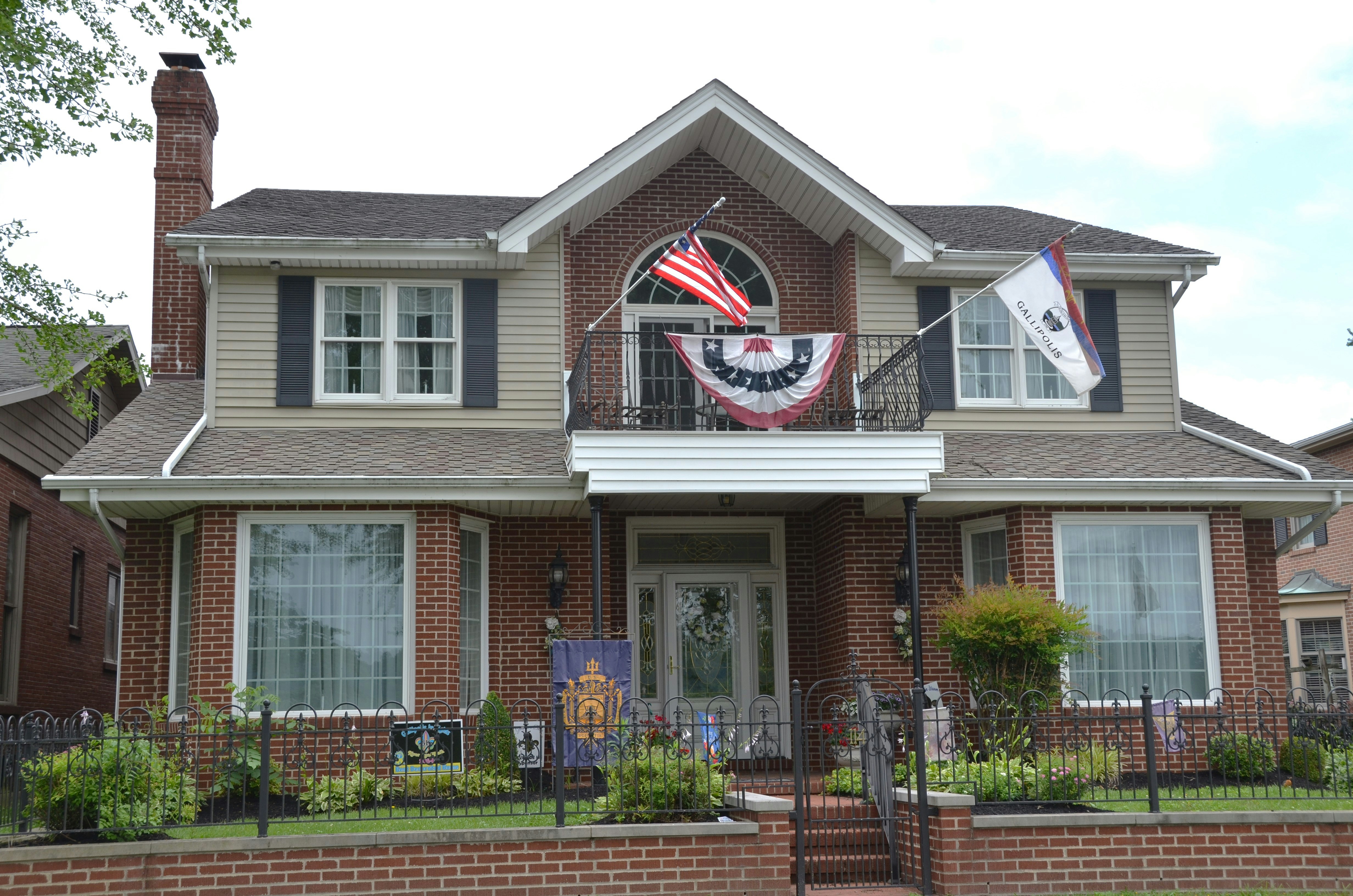 Happy homeowner with renovated home