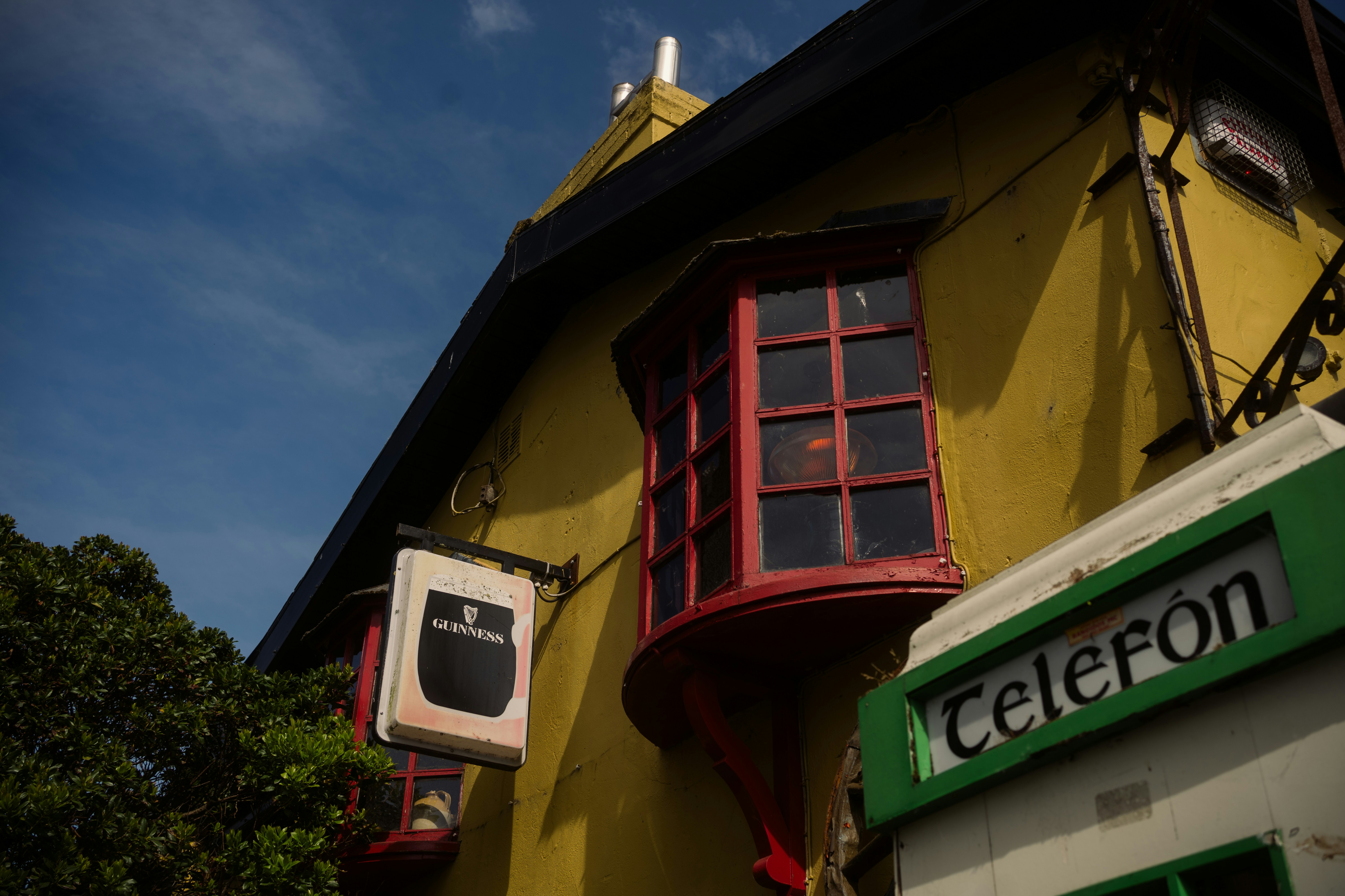 A colorful building with a distinctive red window.