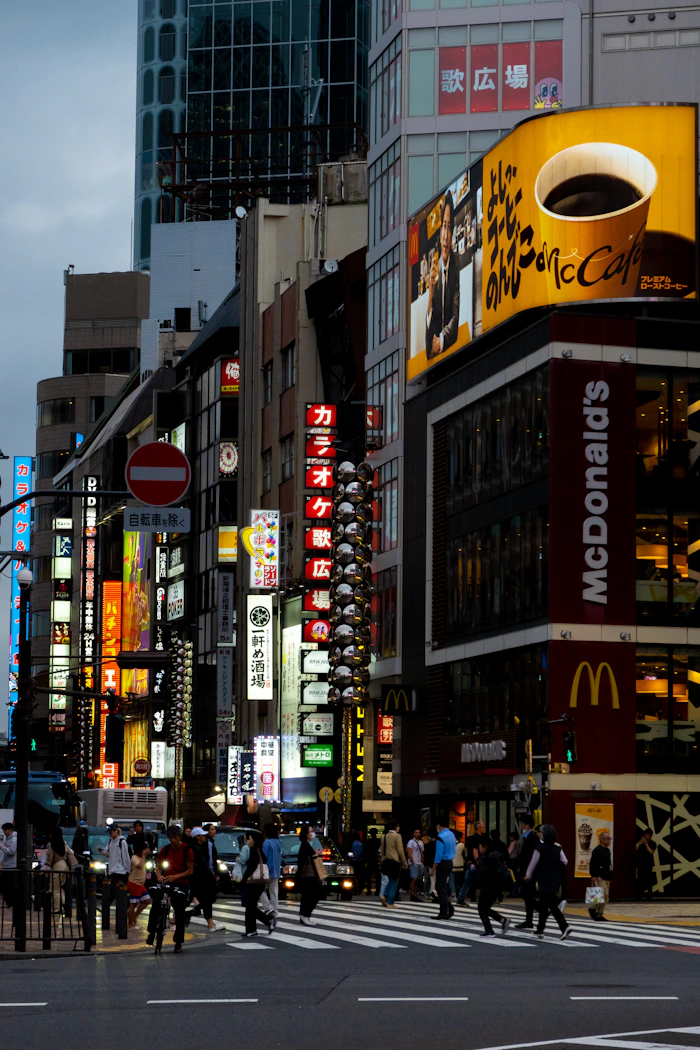 Busy Tokyo street filled with colorful neon signs