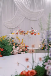 A beautiful wedding table decorated with flowers.