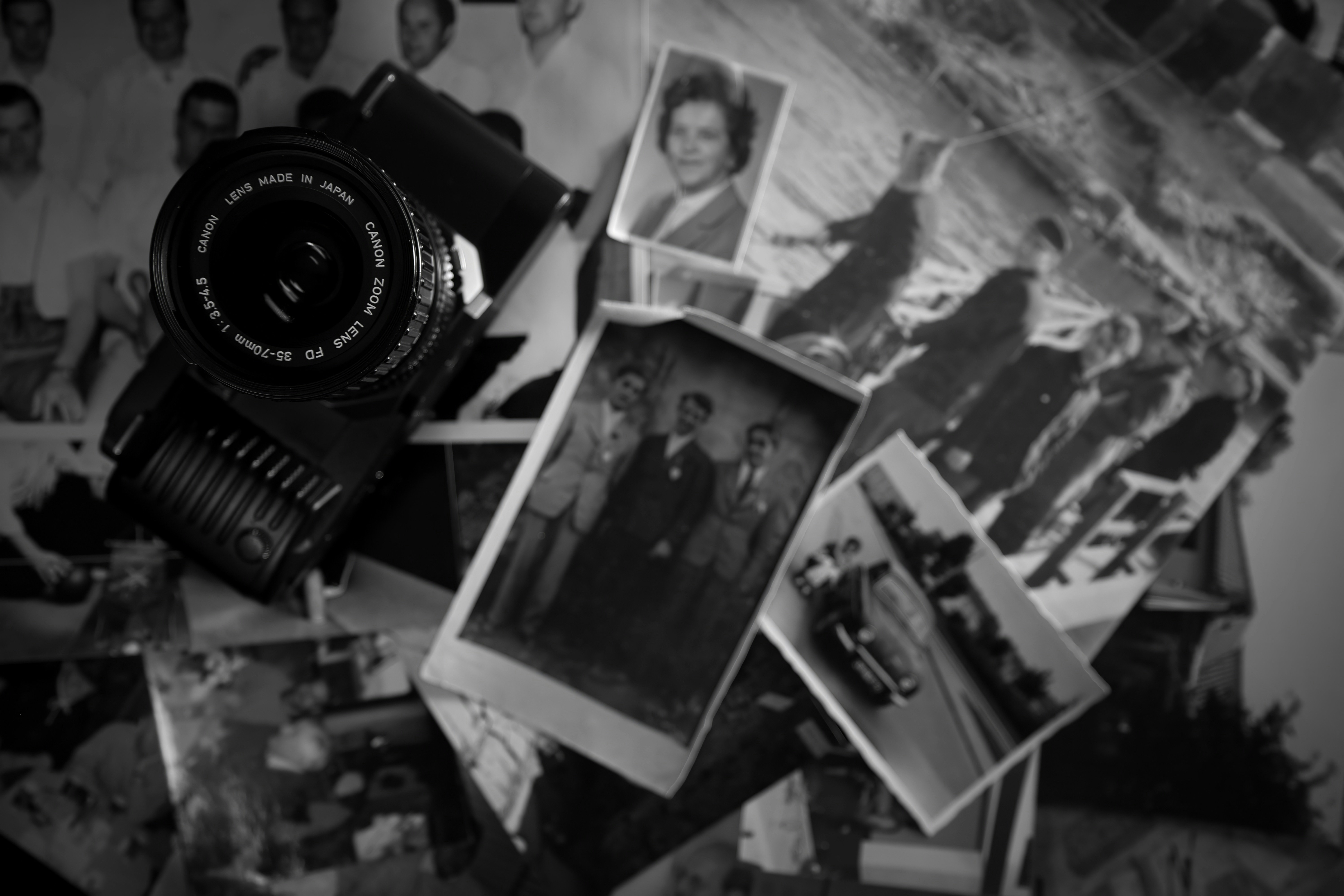 Camera and photographs form a sentimental display.