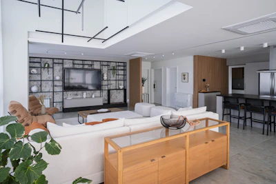 A modern, open-plan living room with beautiful decor.