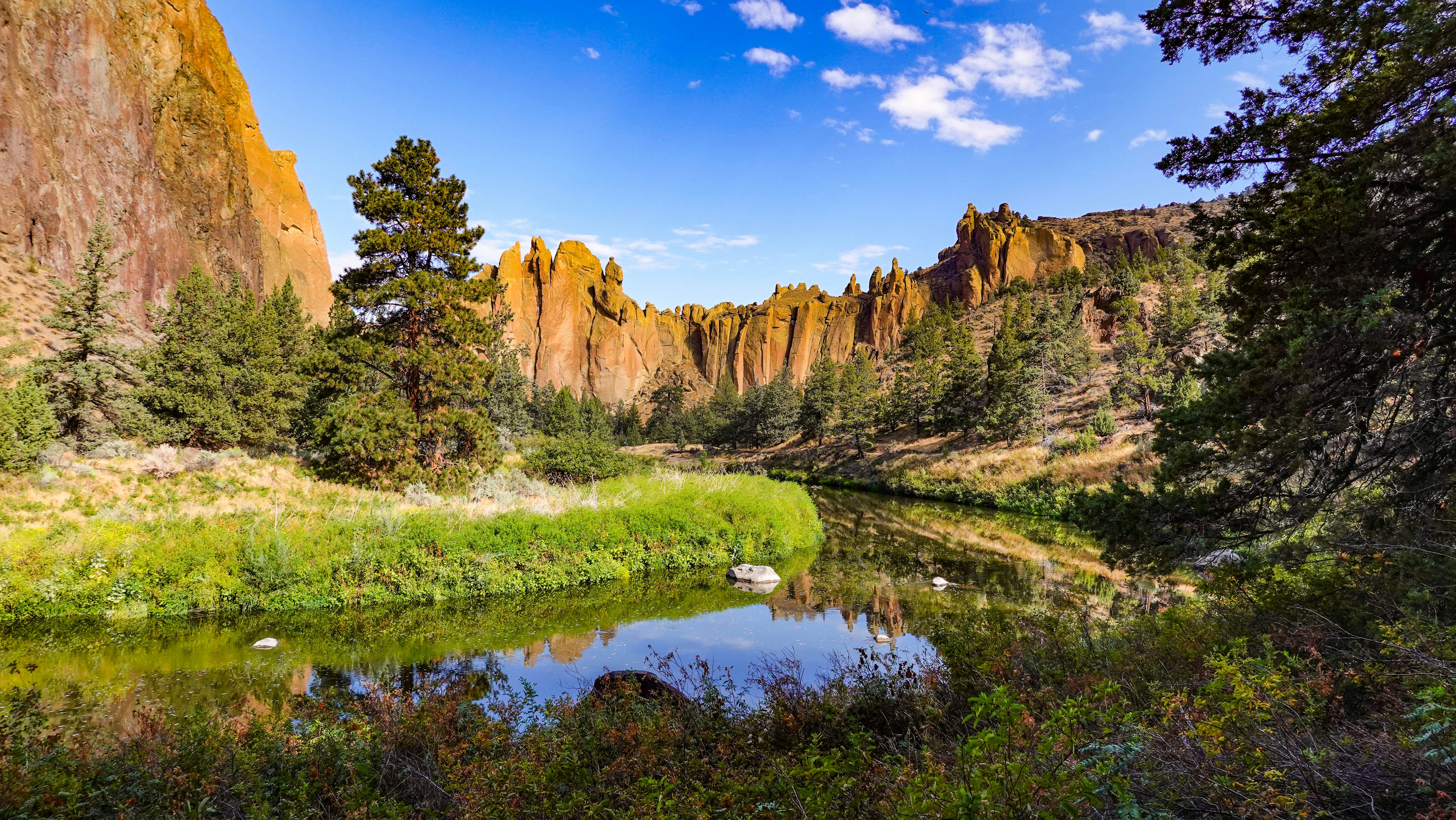 A scenic river flows through a rugged canyon.