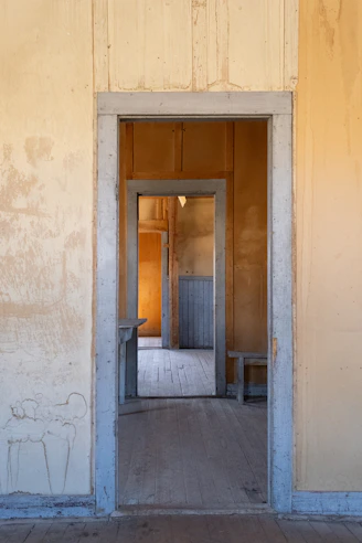 Open doorways lead to the inside of a building.