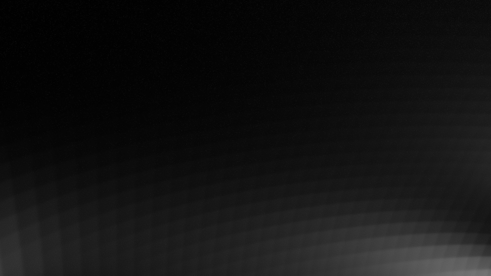 Abstract dark texture with light gradient.