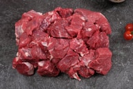 Raw, chopped meat is piled up.