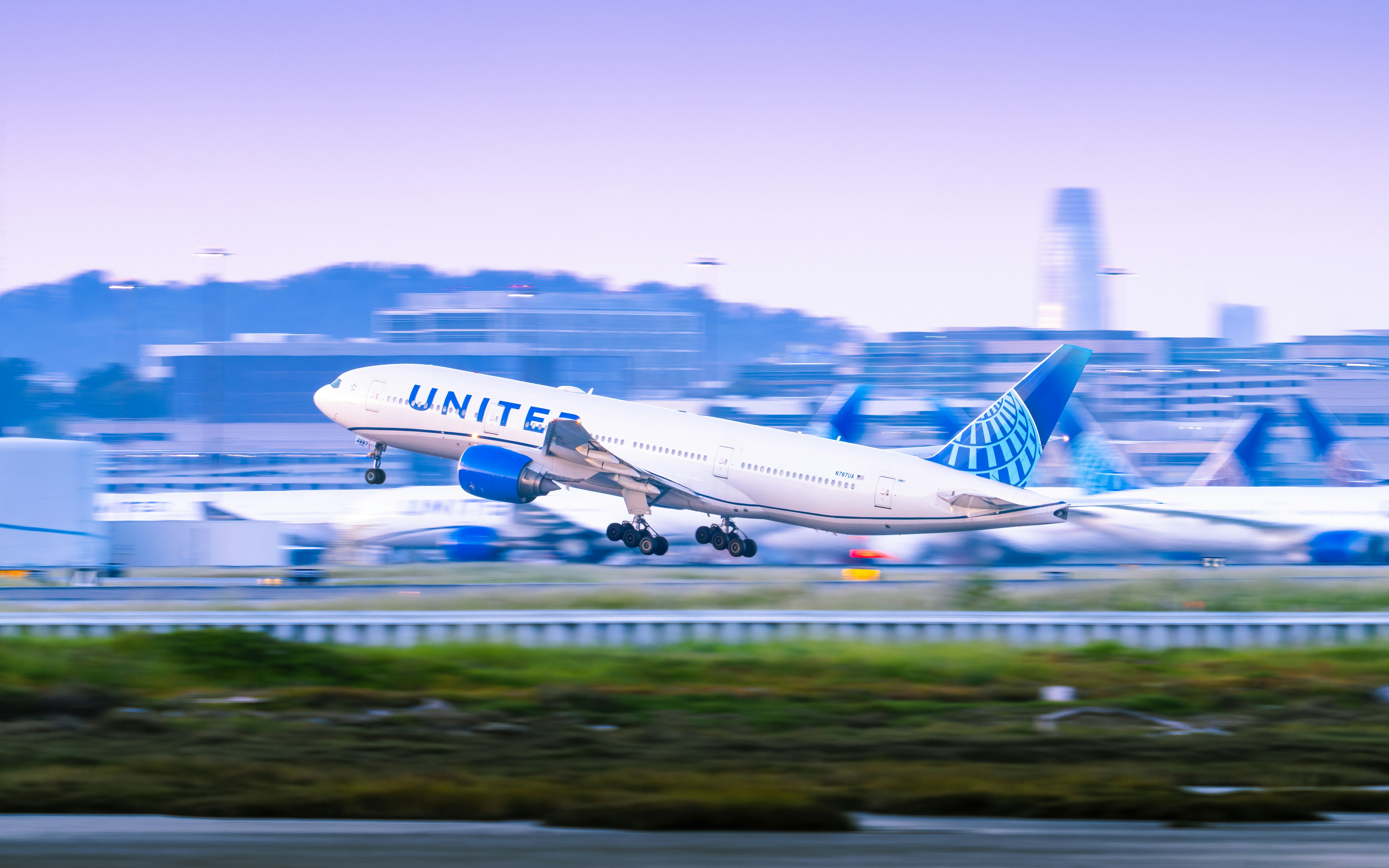 United airlines plane takes off from the runway.