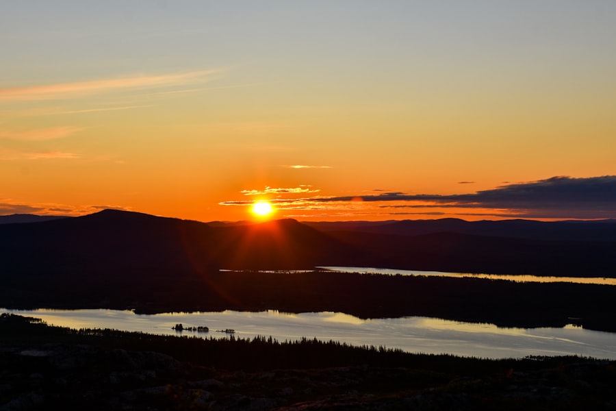 Hikers on an Arctic trail under midnight sun