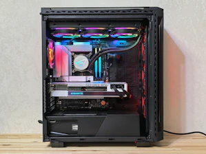 A modern computer tower with color-changing lights.