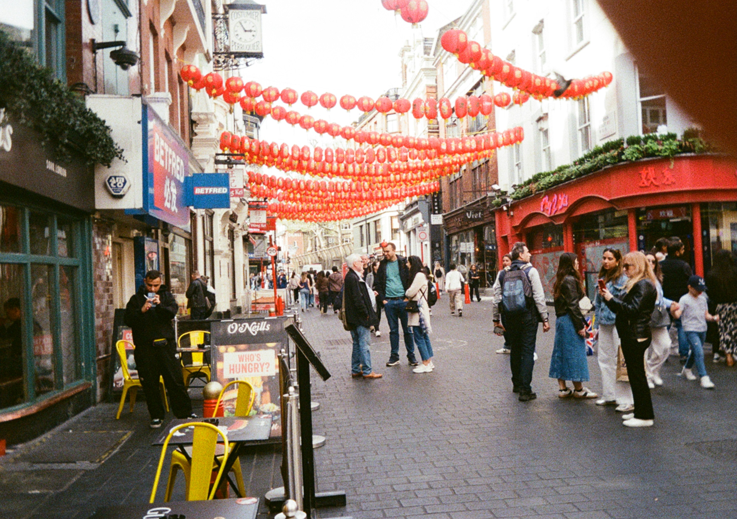 Busy Argyle Street with its distinctive red gateway - five places to go in chicago's uptown neighborhood