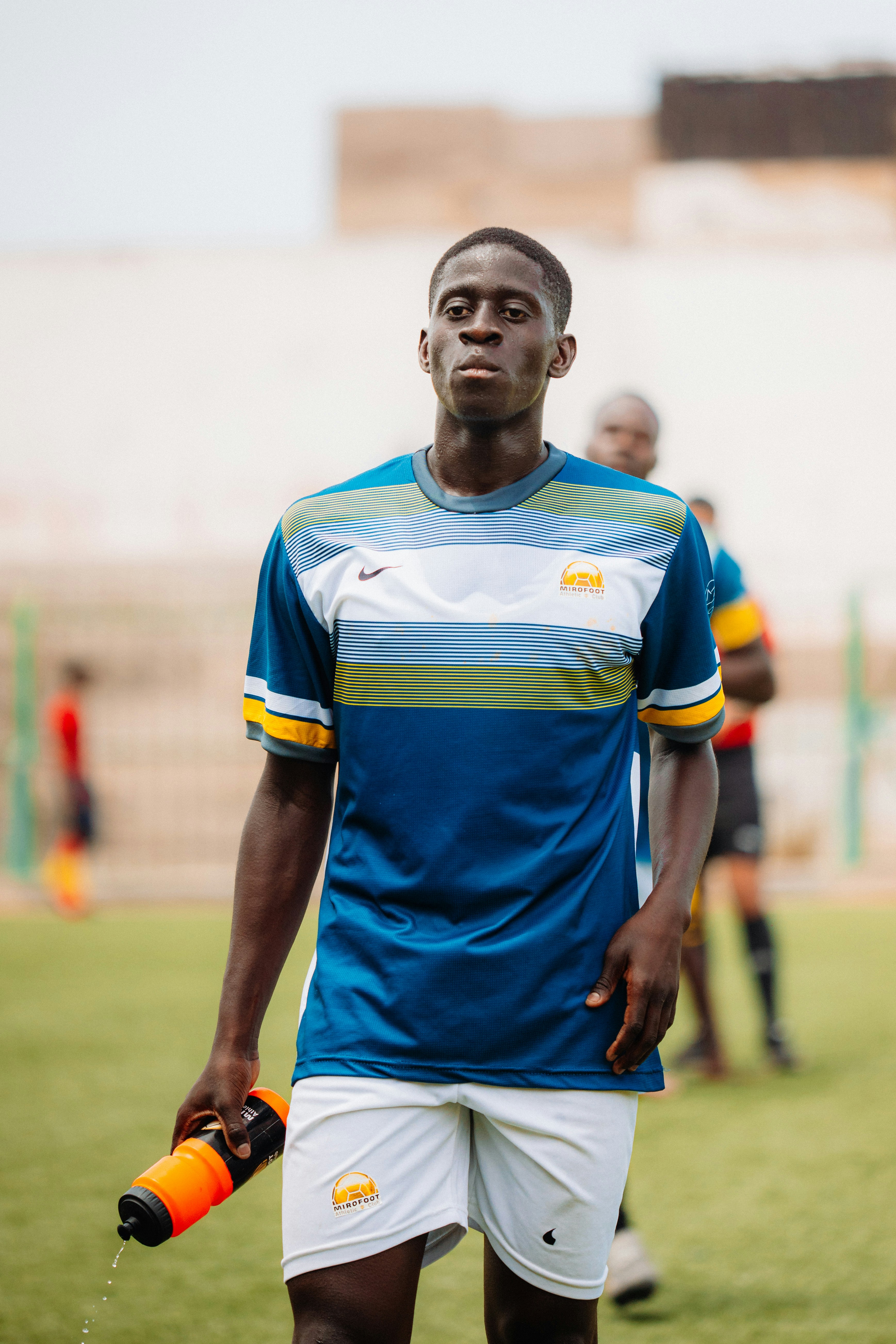 A soccer player is ready for the game