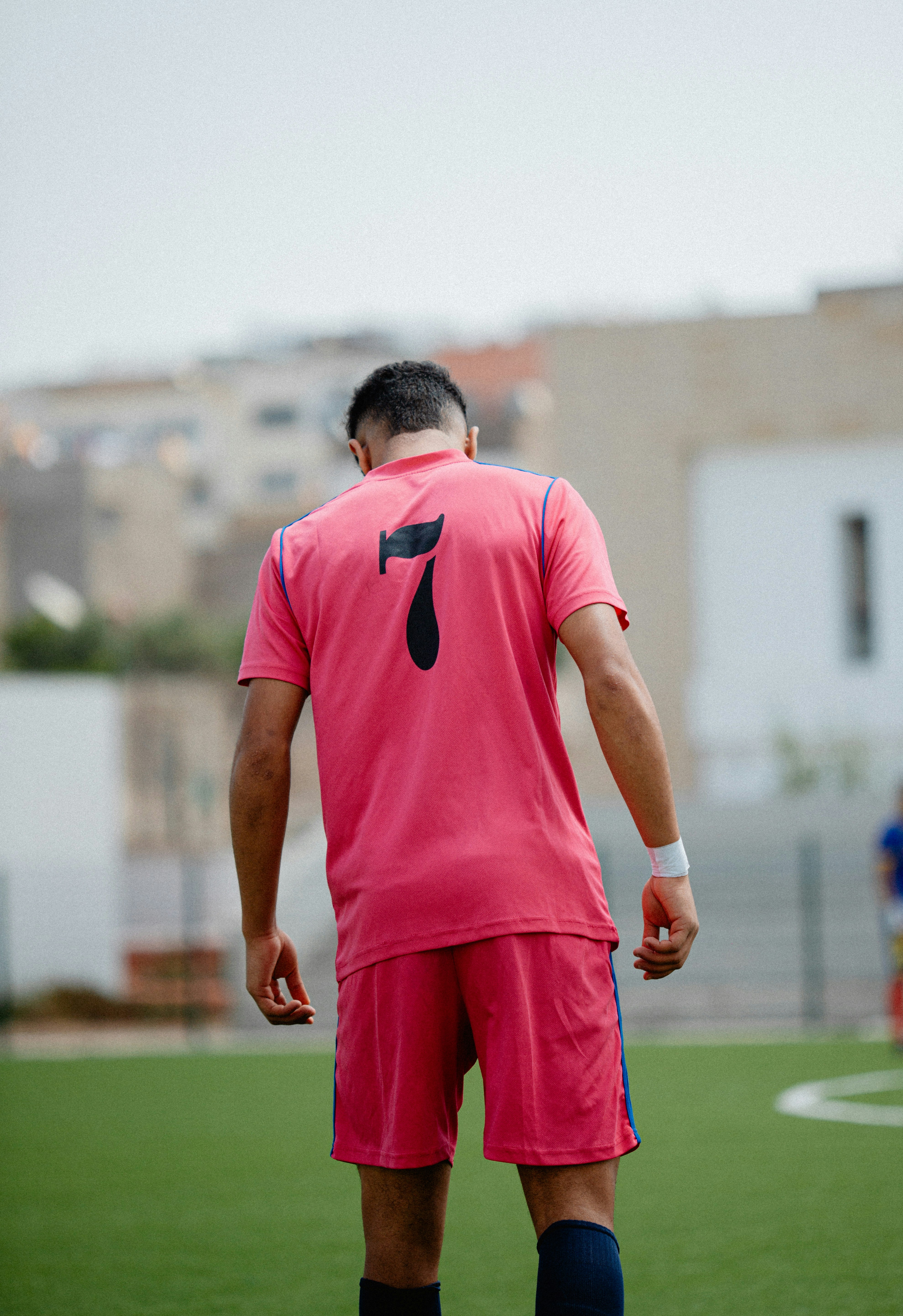 Soccer player with jersey number seven.