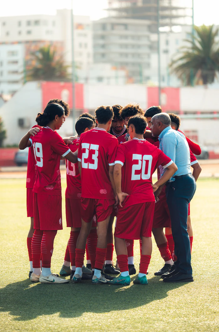 Team huddle with coach