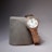 A luxurious diamond-encrusted watch is displayed.