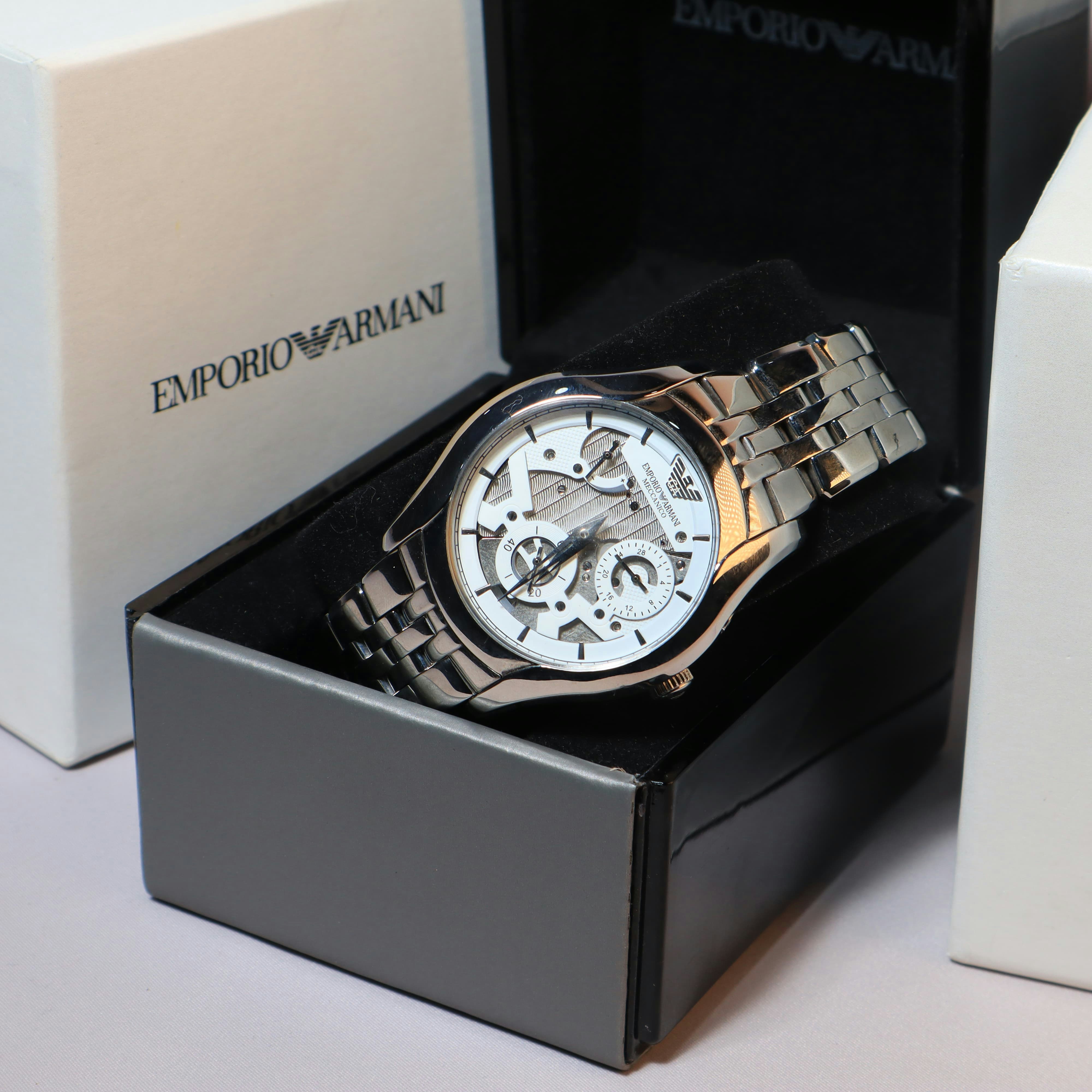 An emporio armani watch is displayed in its box.