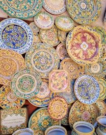 Beautiful, colorful, decorated ceramics on display.