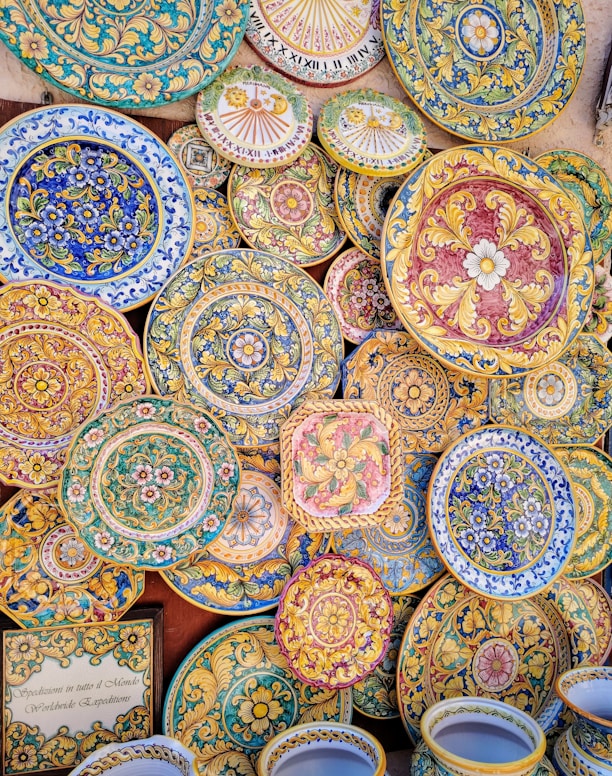 Beautiful, colorful, decorated ceramics on display.