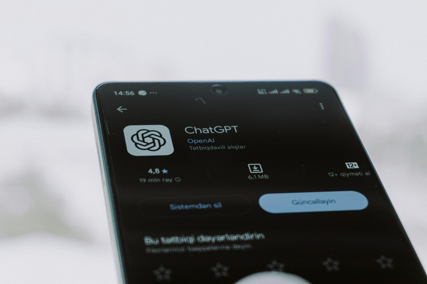 A phone displaying the ChatGPT app