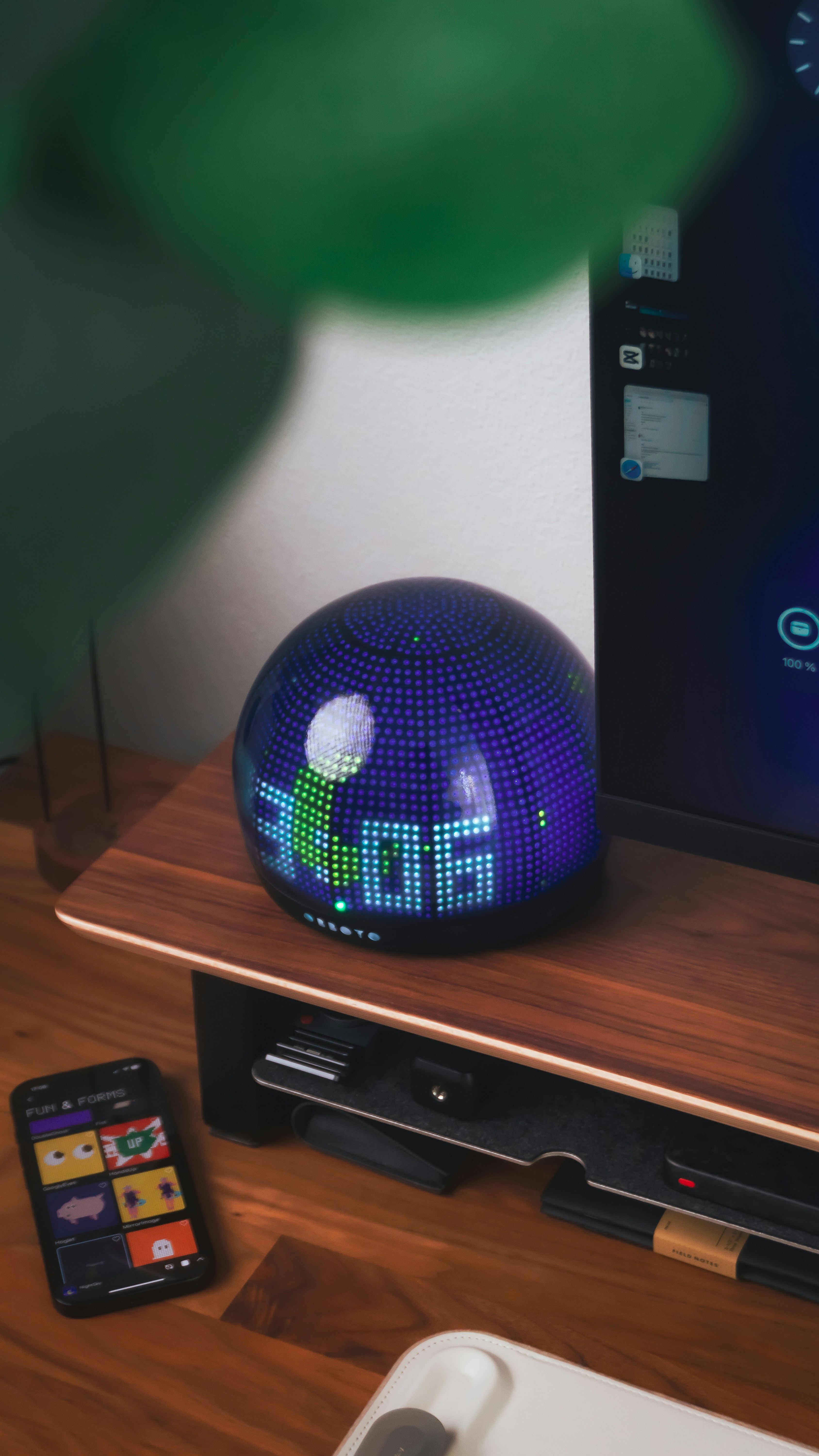 A smart clock displays the time.