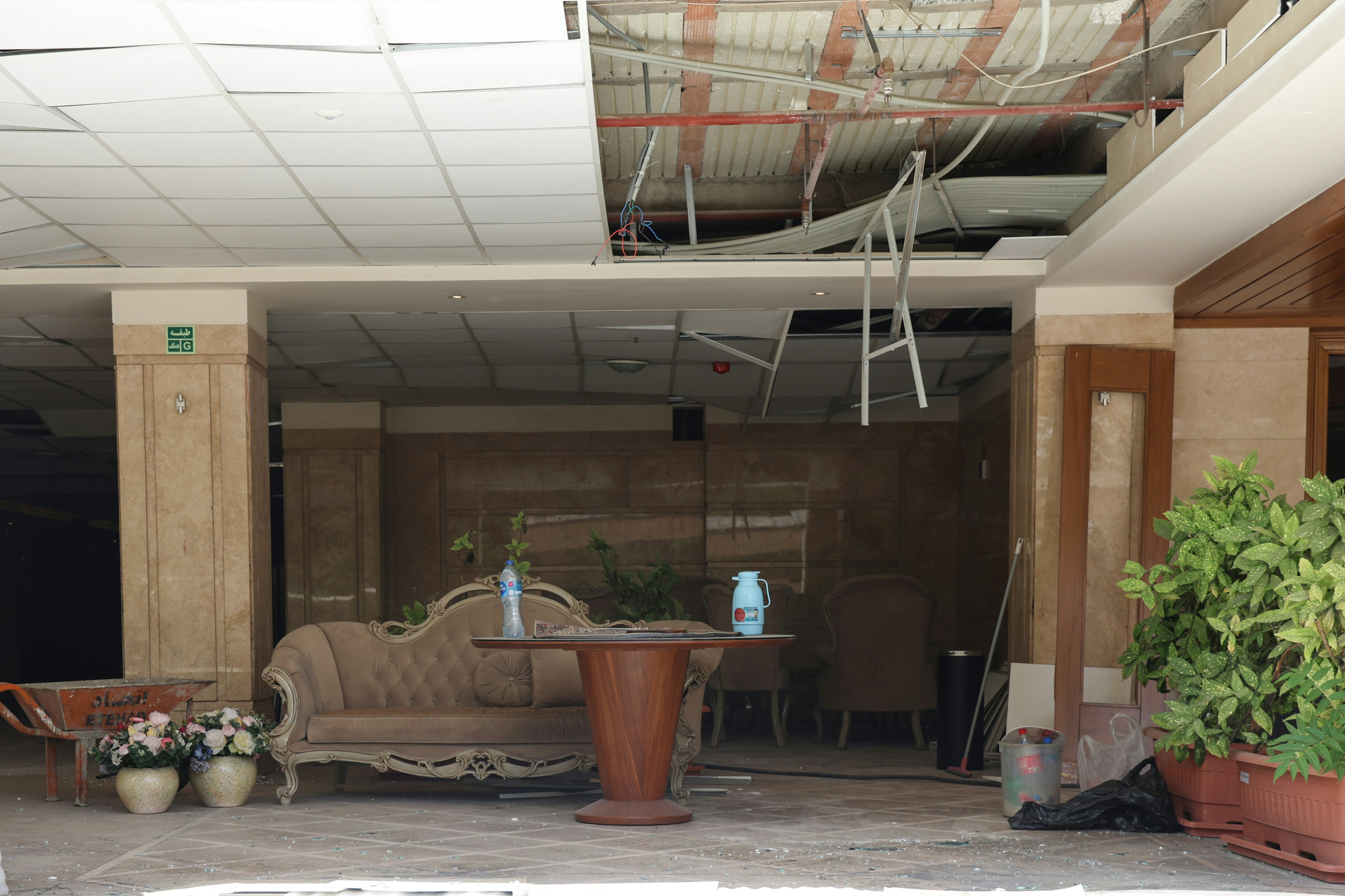 water damage on a ceiling inside a commercial building - roof waterproofing solutions