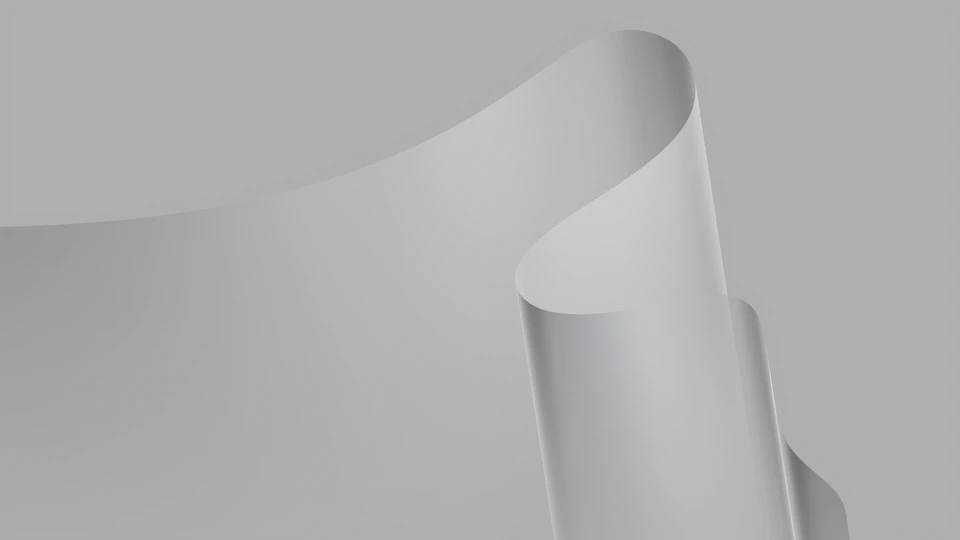 White paper boat floats on gray surface with billowing sails against gradient backdrop