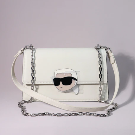 A white karl lagerfeld handbag is shown.
