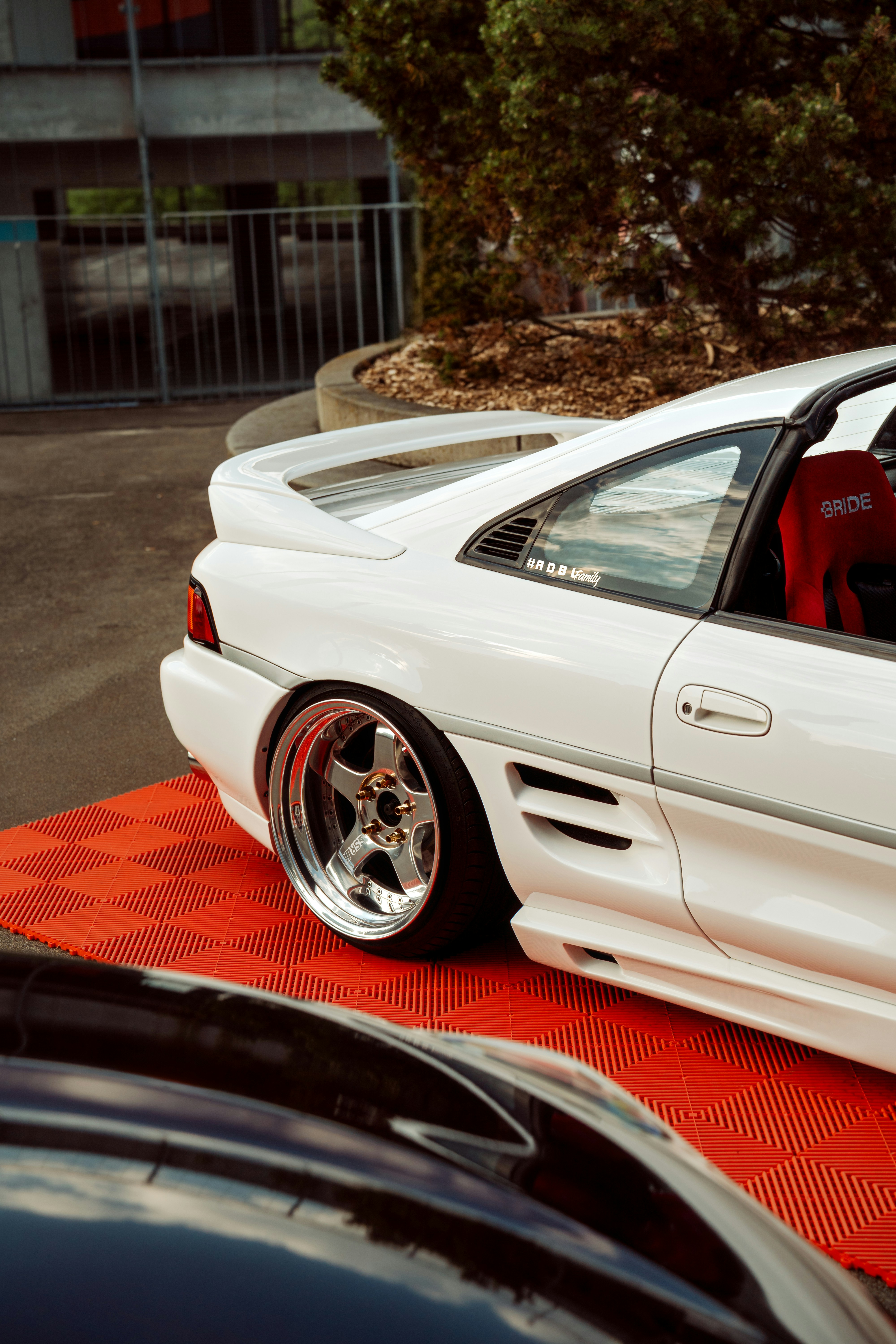 White sports car shows off its sleek design.