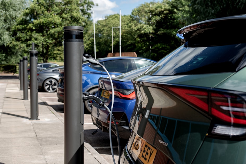 Electric cars are charging at a charging station