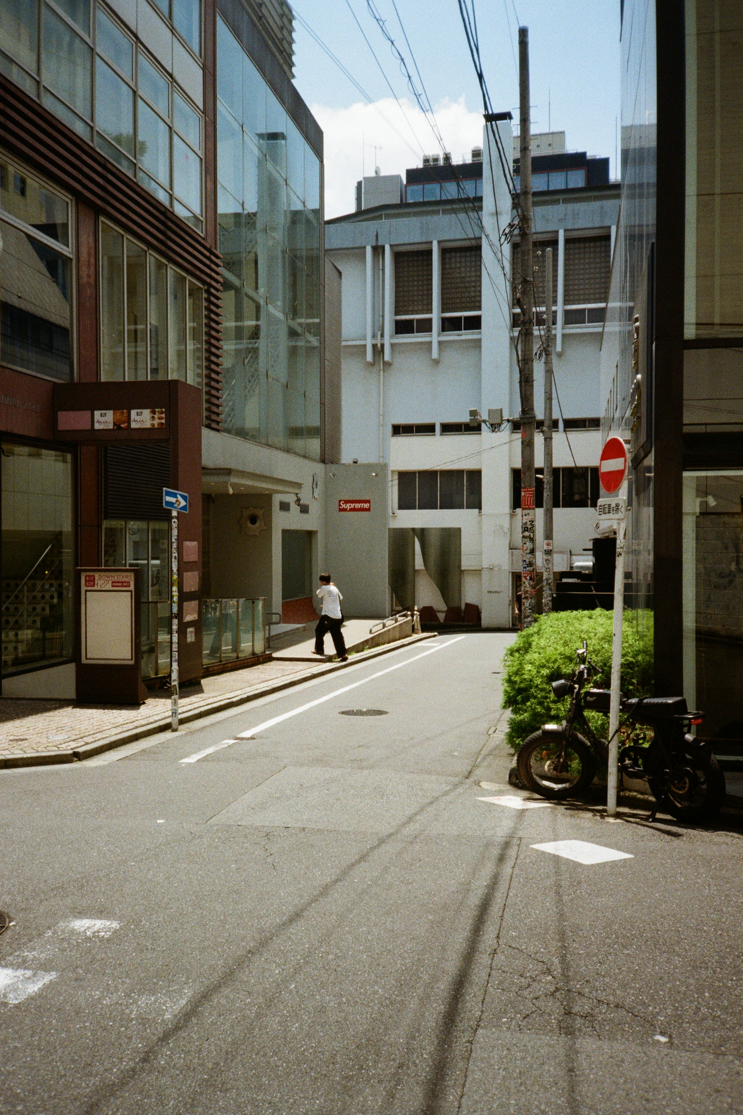 A street in japan on a sunny day.