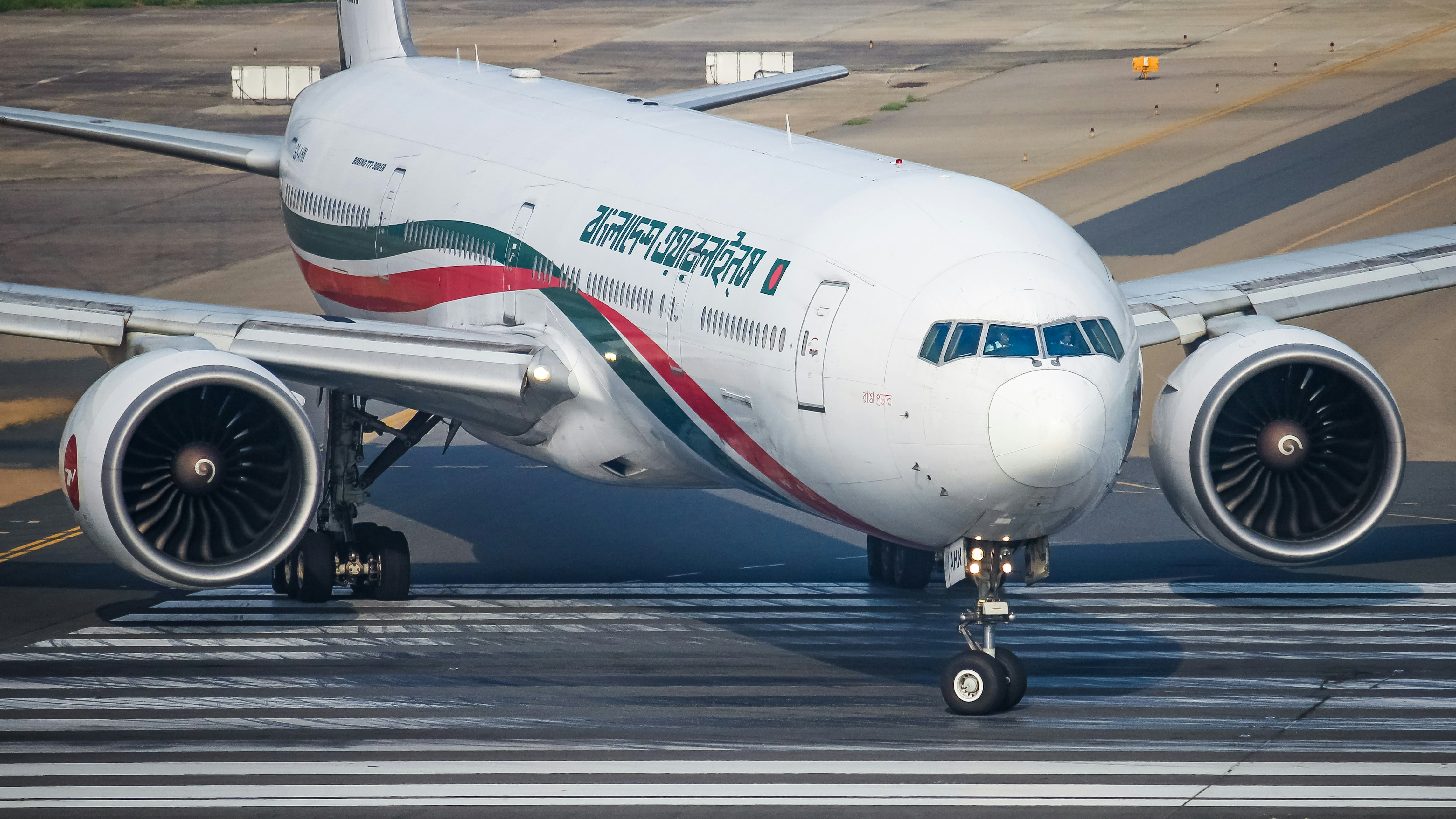 A plane is taxiing on the runway.