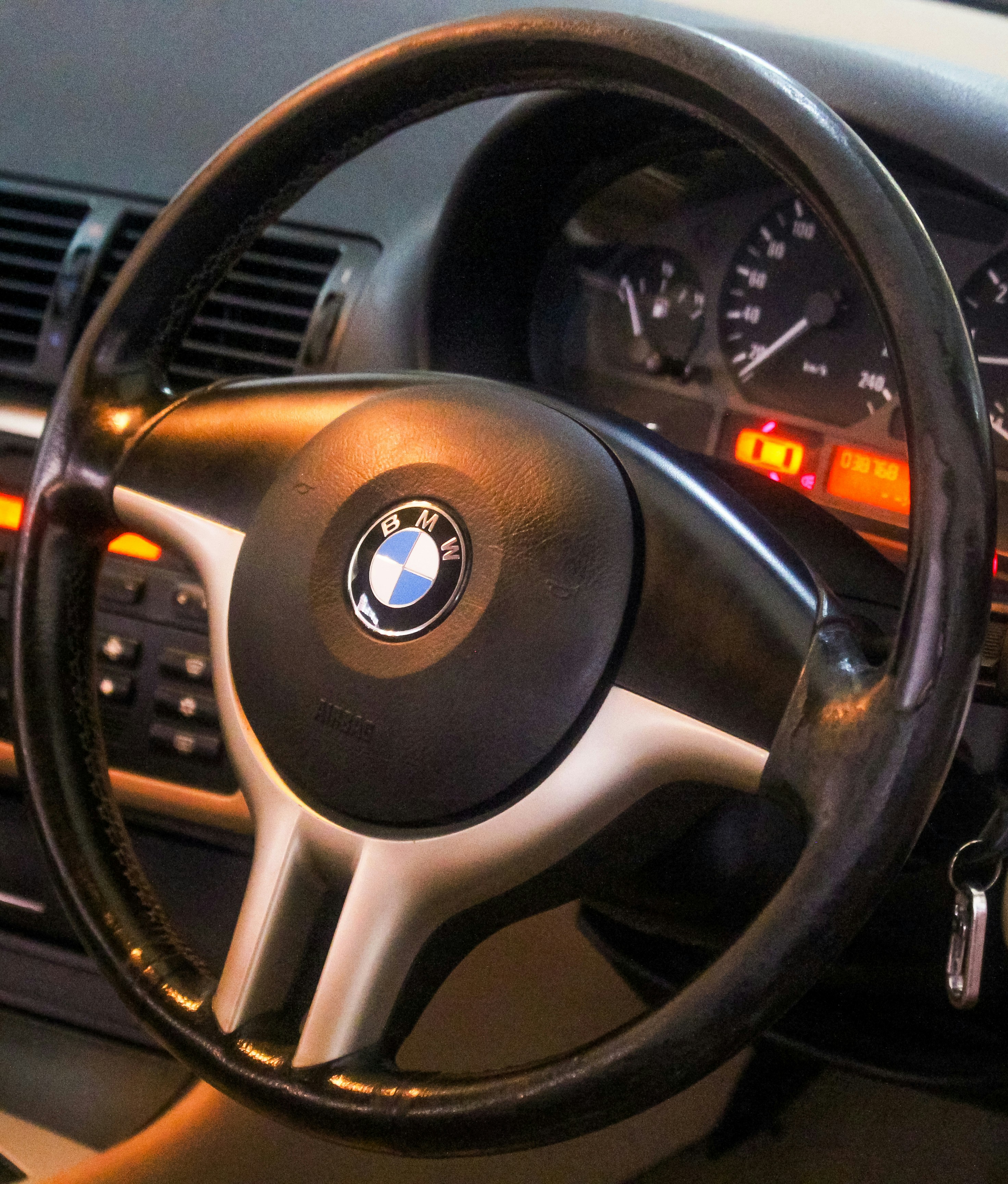 BMW car steering wheel close-up.